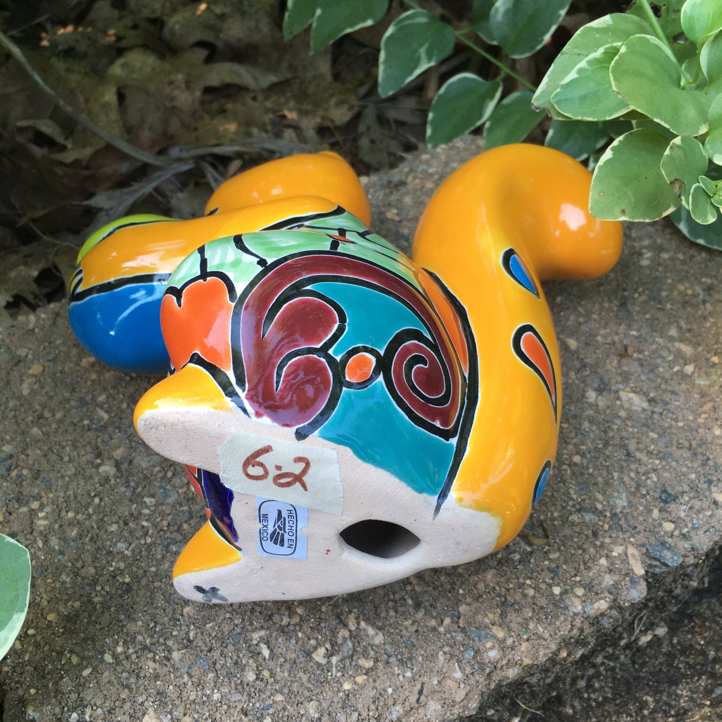 Talavera squirrel holding nut bottom