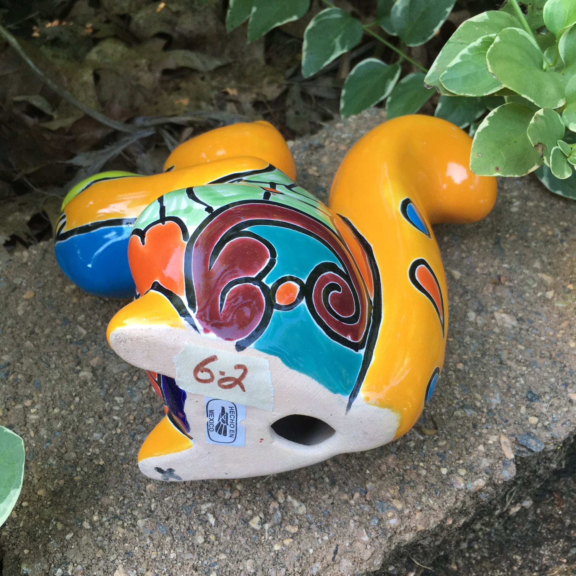 Talavera squirrel holding nut bottom