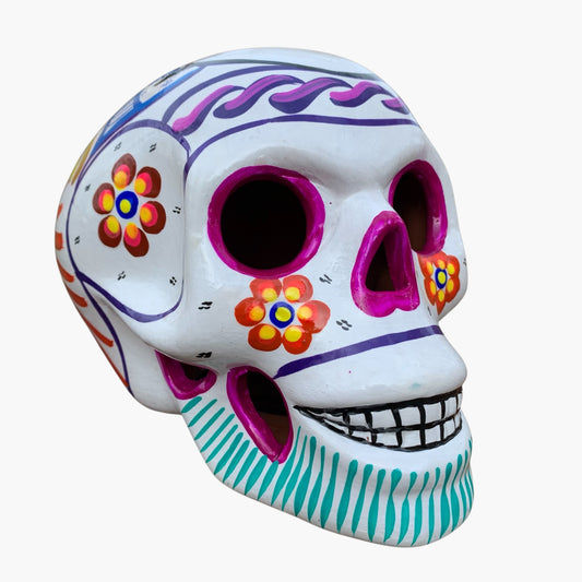 Colorful Mexican Sugar skull white with vibrant designs on a white background