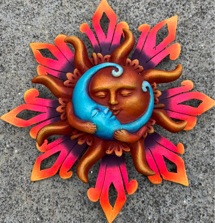 Glowing sun with blue moon Amore