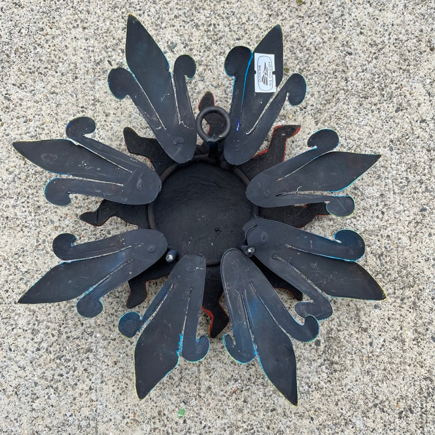 Sun holding pink moon metal art back