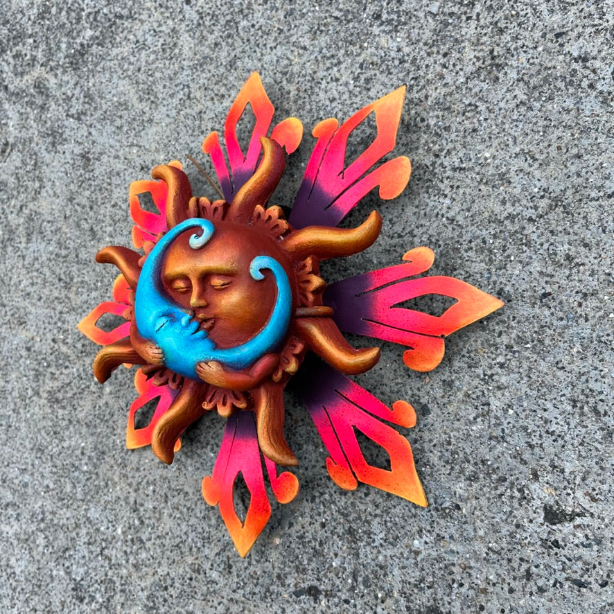 Sun holding blue moon amore sun side