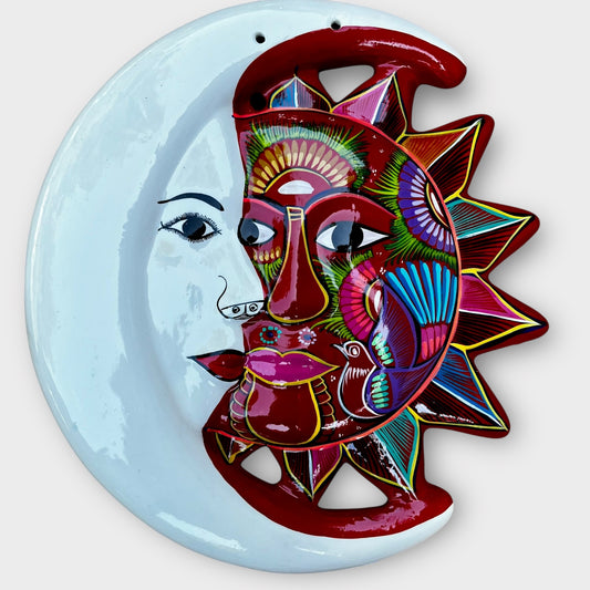 Folk art sun and moon eclipse