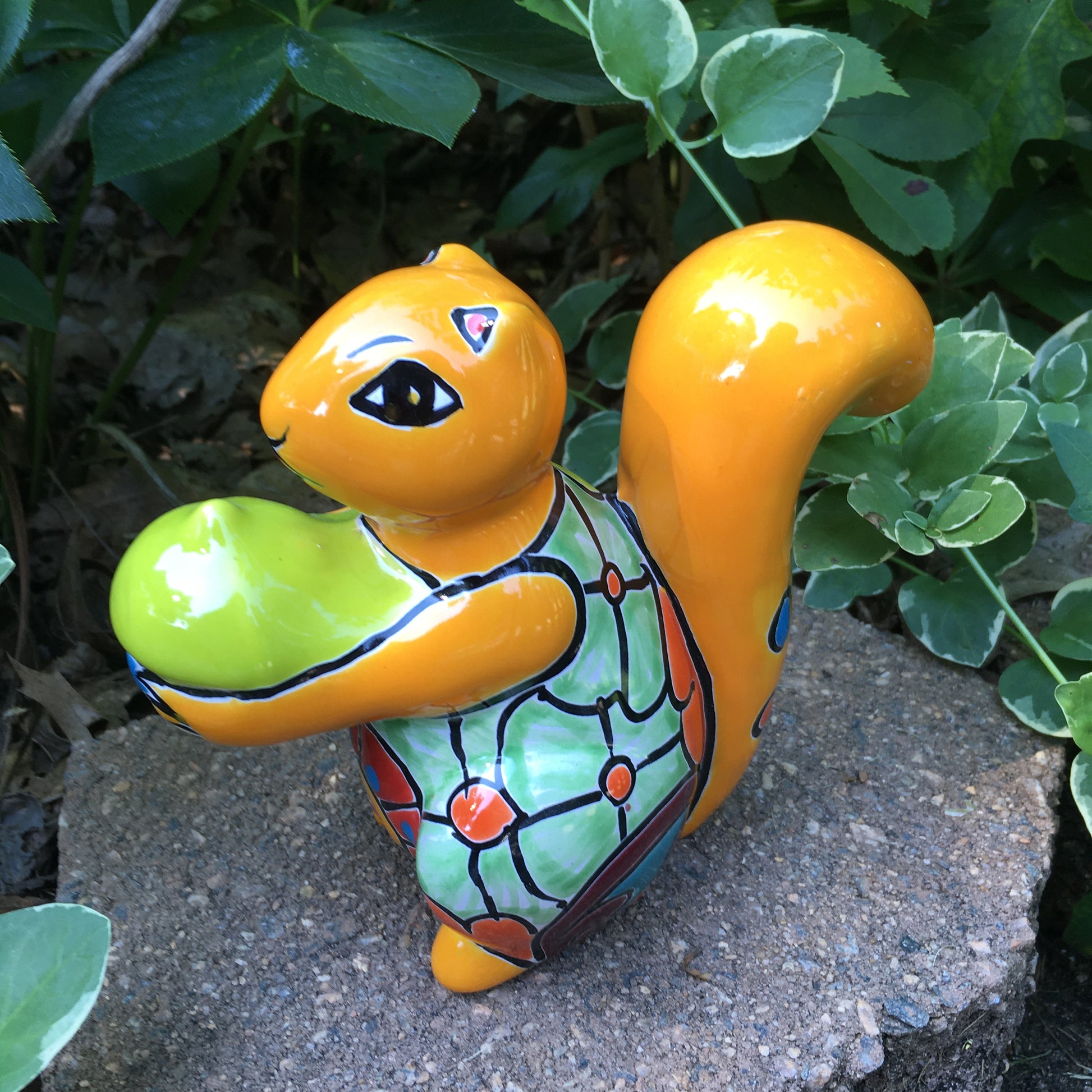 Talavera squirrel holding nut side