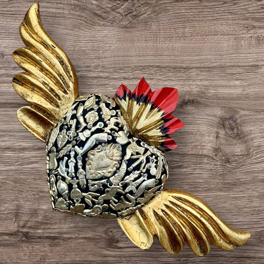 Milagros decorated sacred heart with wings