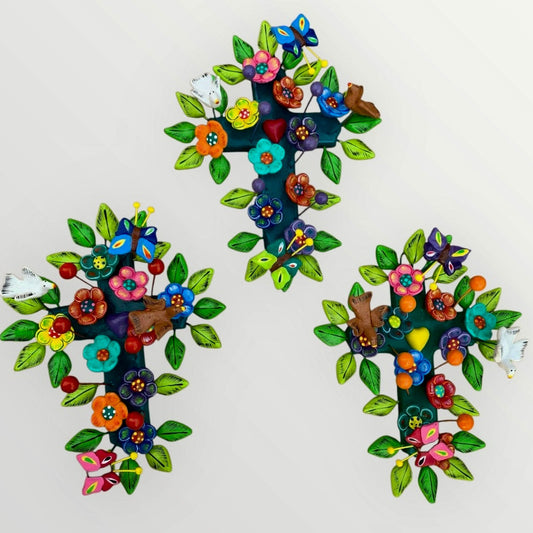 Ortega Pottery Folk art cross with leaves, flowers and butterflies.