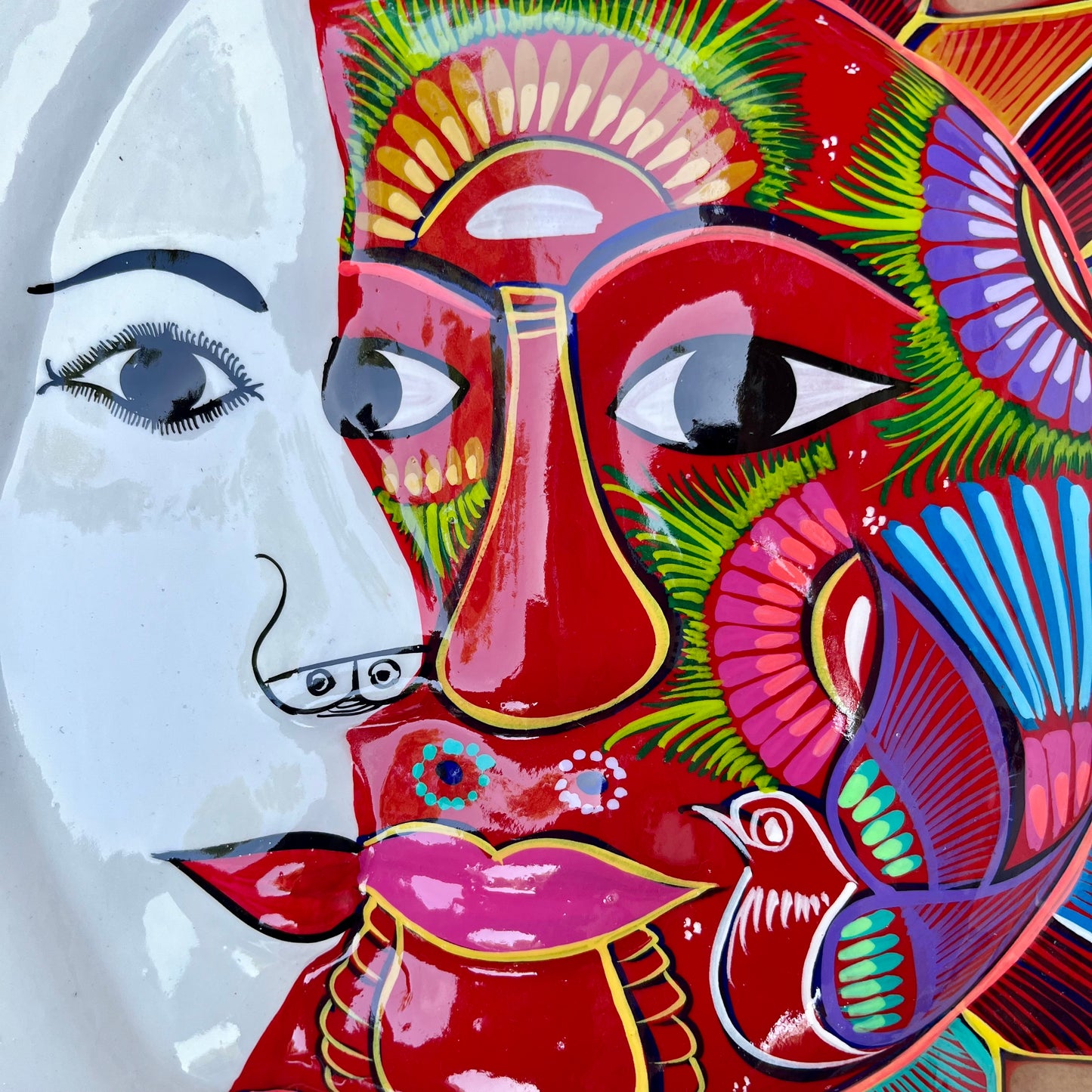 Folk art sun and moon eclipse faces