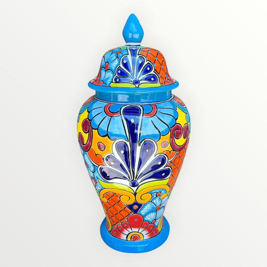 Colorful Mexican Talavera ceramic jar with lid decorated with intricate multicolor traditional patterns