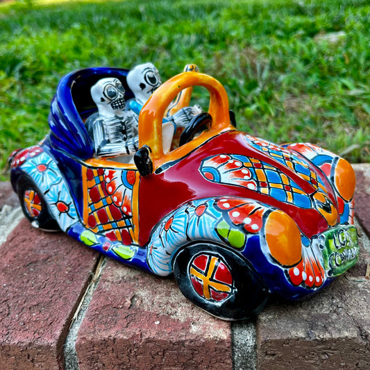 Mexican Catrina friends in a convertible
