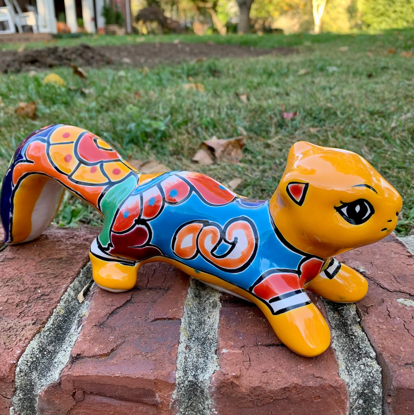 Talavera squirrel with long tail yellow amarillo