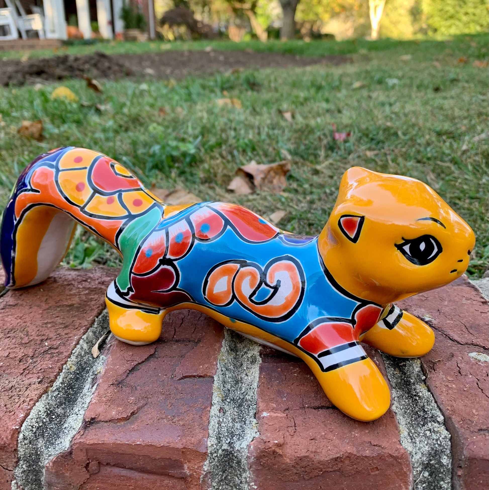 Talavera squirrel with long tail yellow amarillo