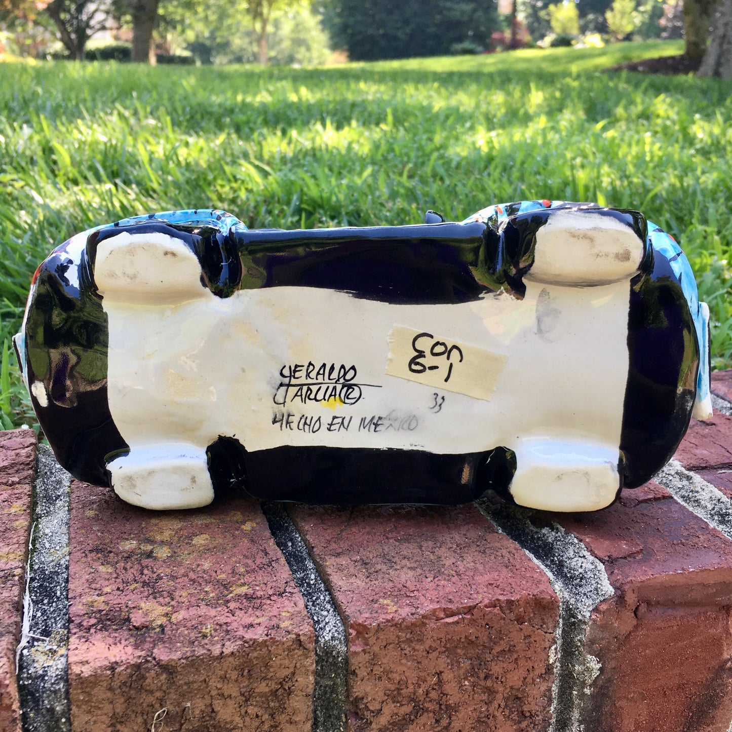 Cruising CATRINA’s and blue convertible signed bottom