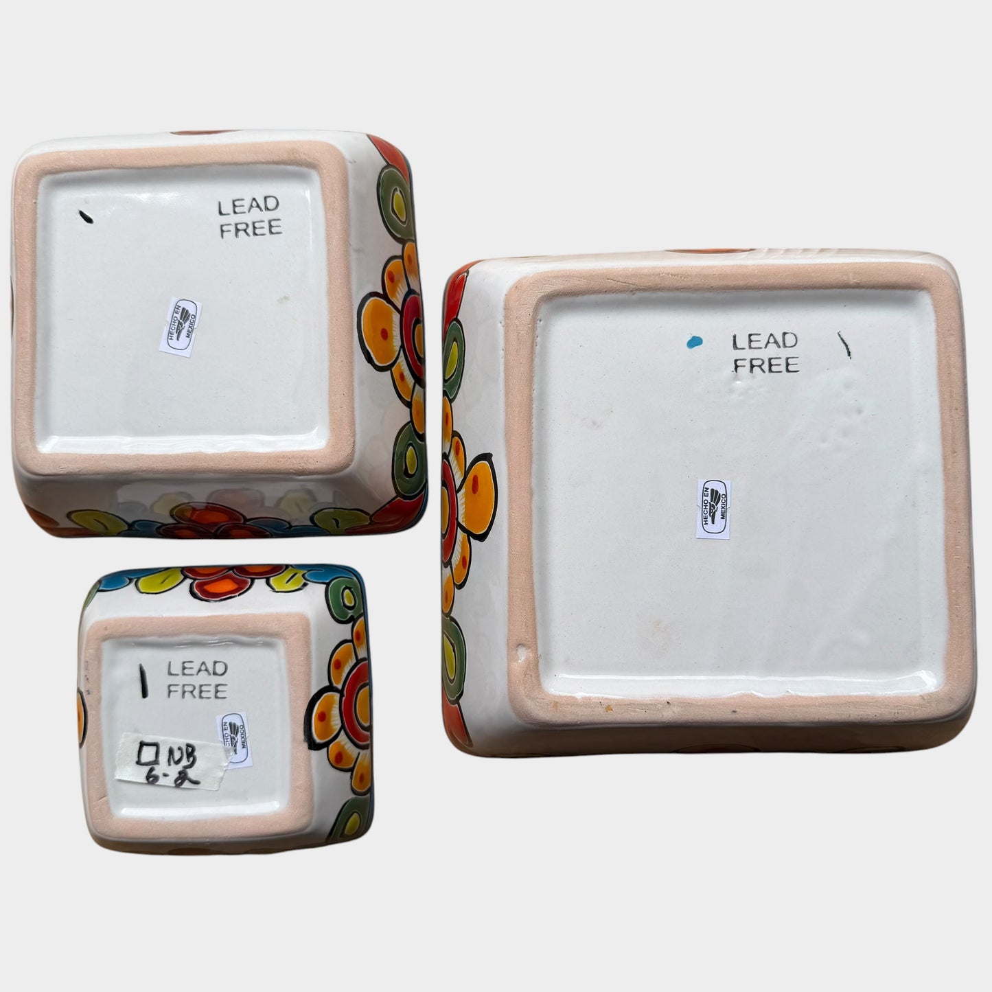 Three colorful talavera square nesting bowls with intricate patterns Bottom