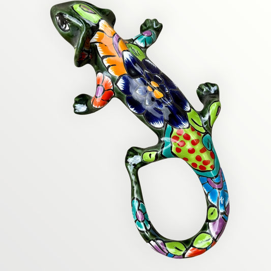 Mexican Talavera wall mounted iguana in dark green with multicolor designs.