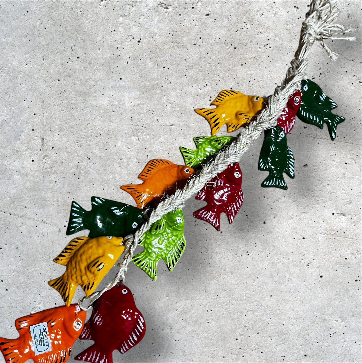 Ceramic tropical fish on a string back
