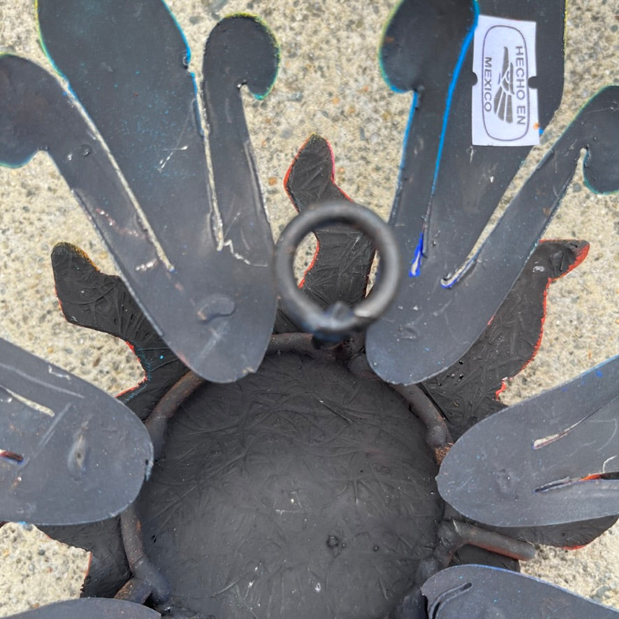 Sun holding pink moon metal art close up Hook