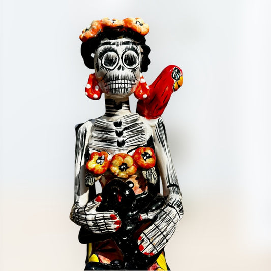 Frida friends Catrina sentada face