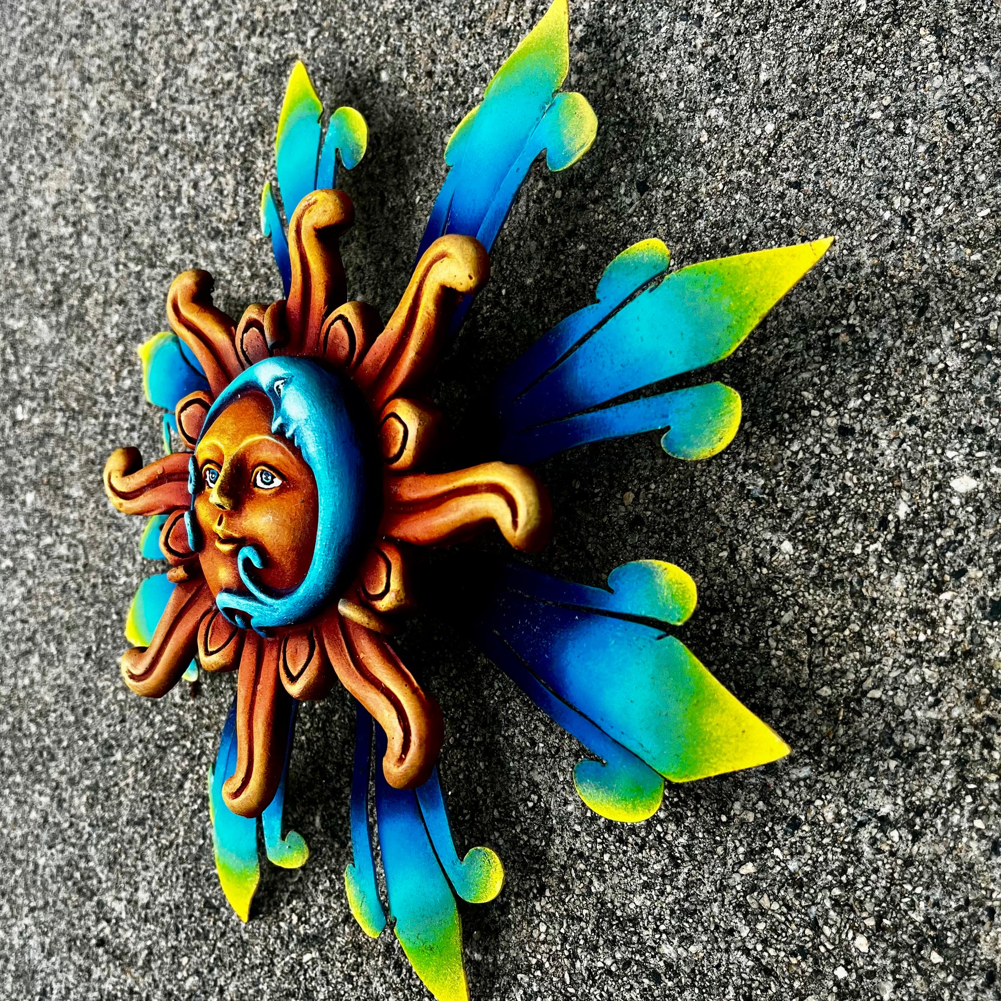 Sun with blue moon wall art side view