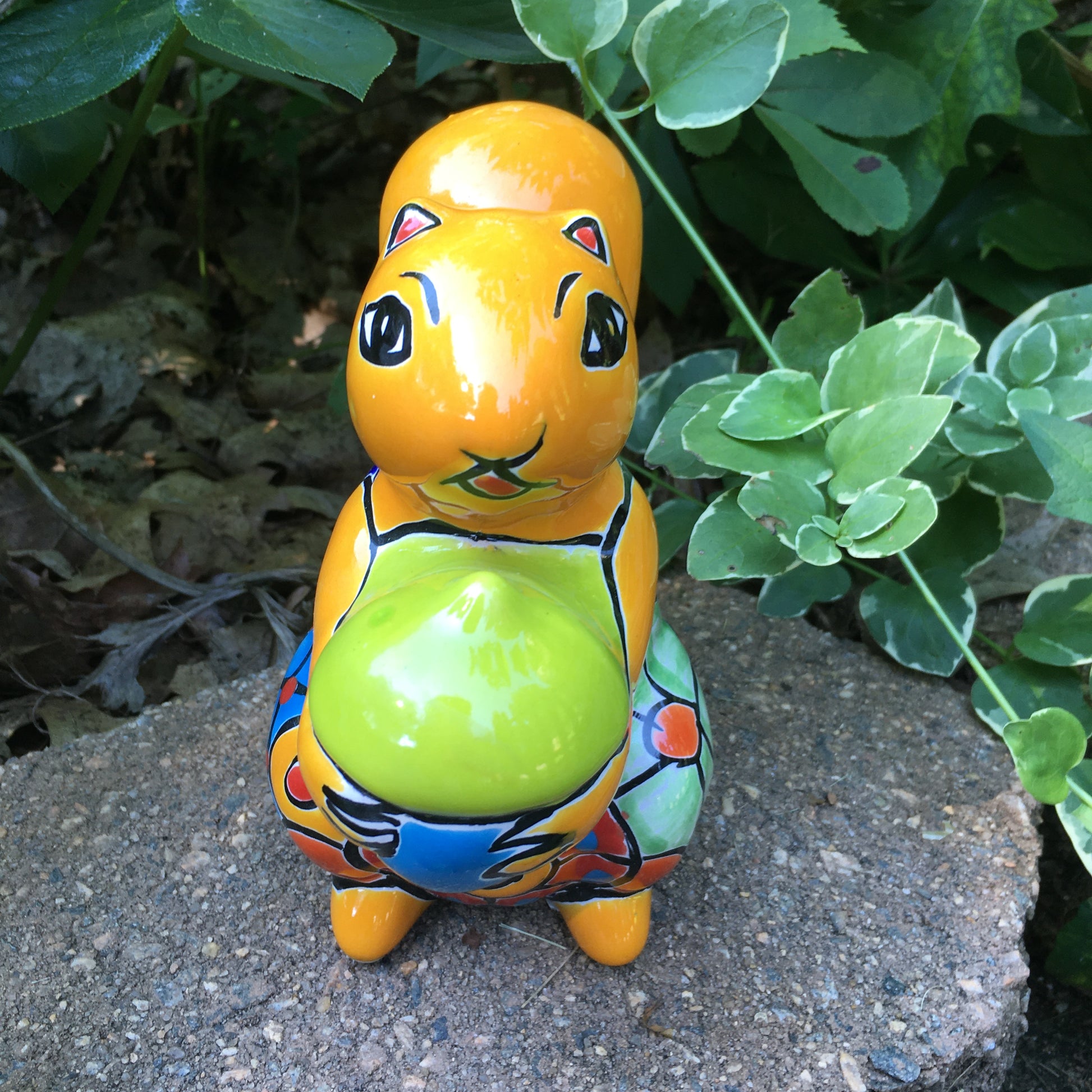 Talavera squirrel holding nut front
