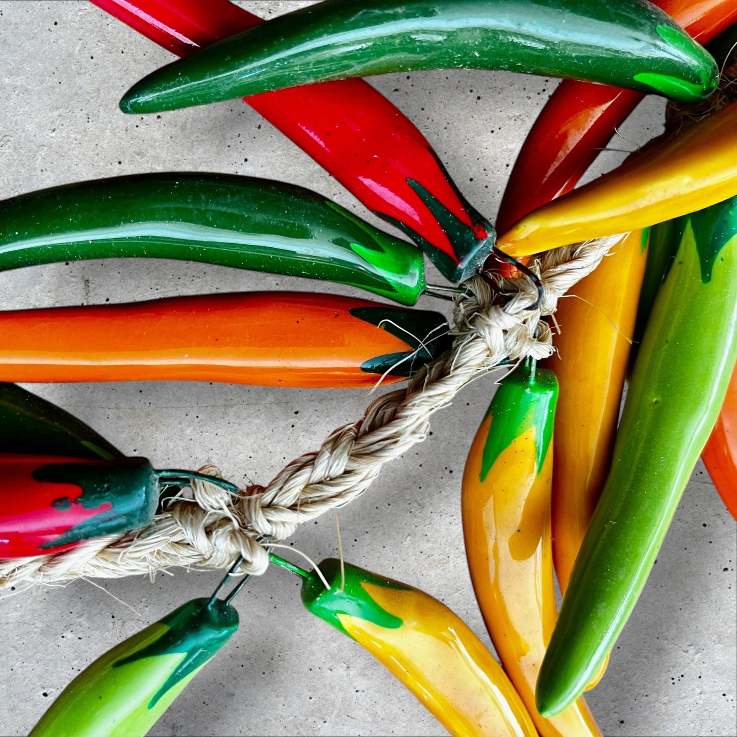 Chili peppers attached to rope