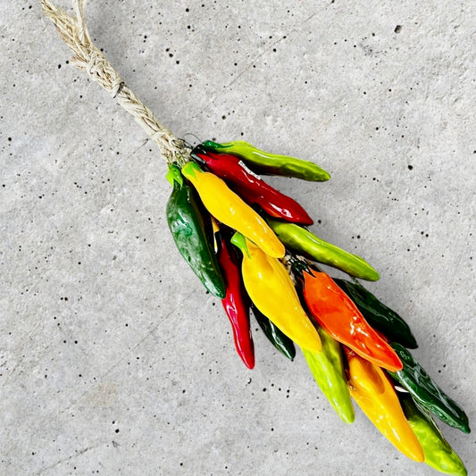 Multicolor chili peppers on a string