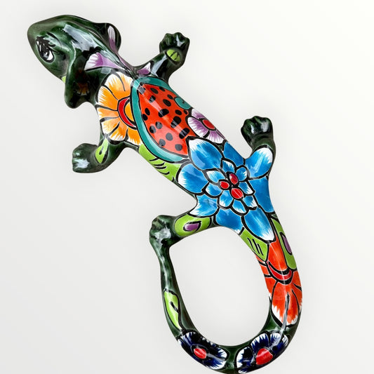 Mexican Talavera wall mounted iguana in dark green with multicolor designs.