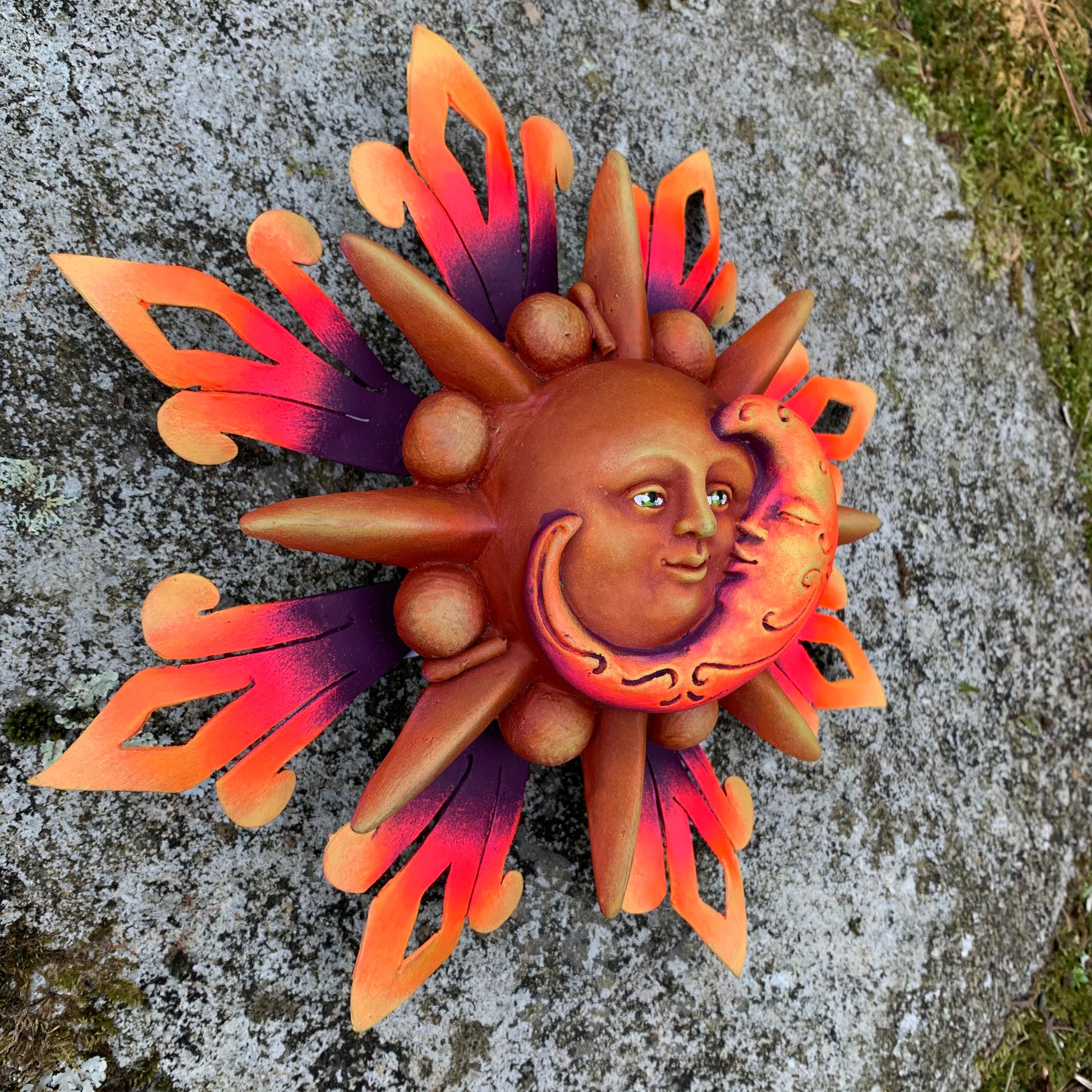 sun and moon sculpture
