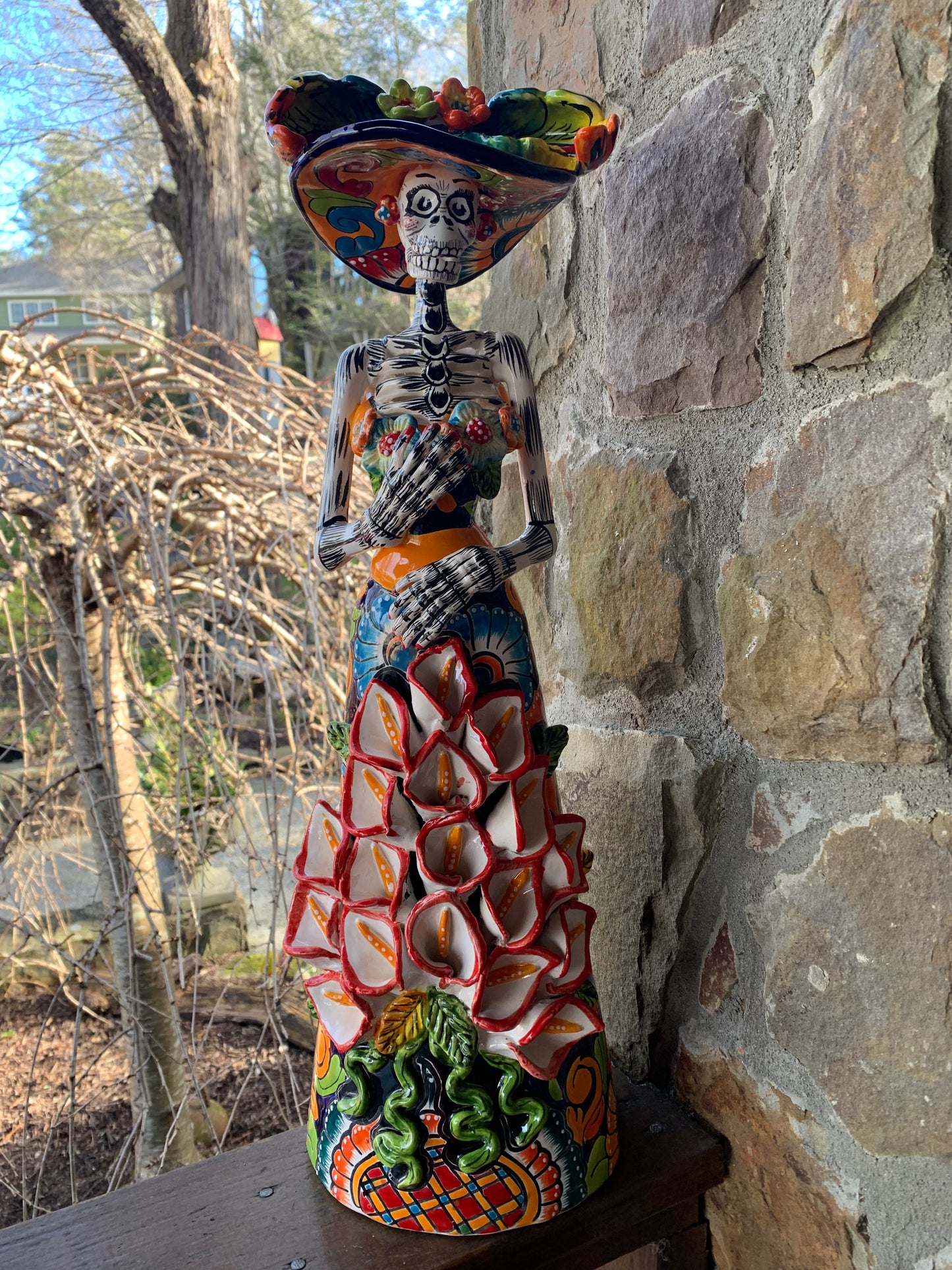 Talavera Catrina skeleton doll with Cala lilies