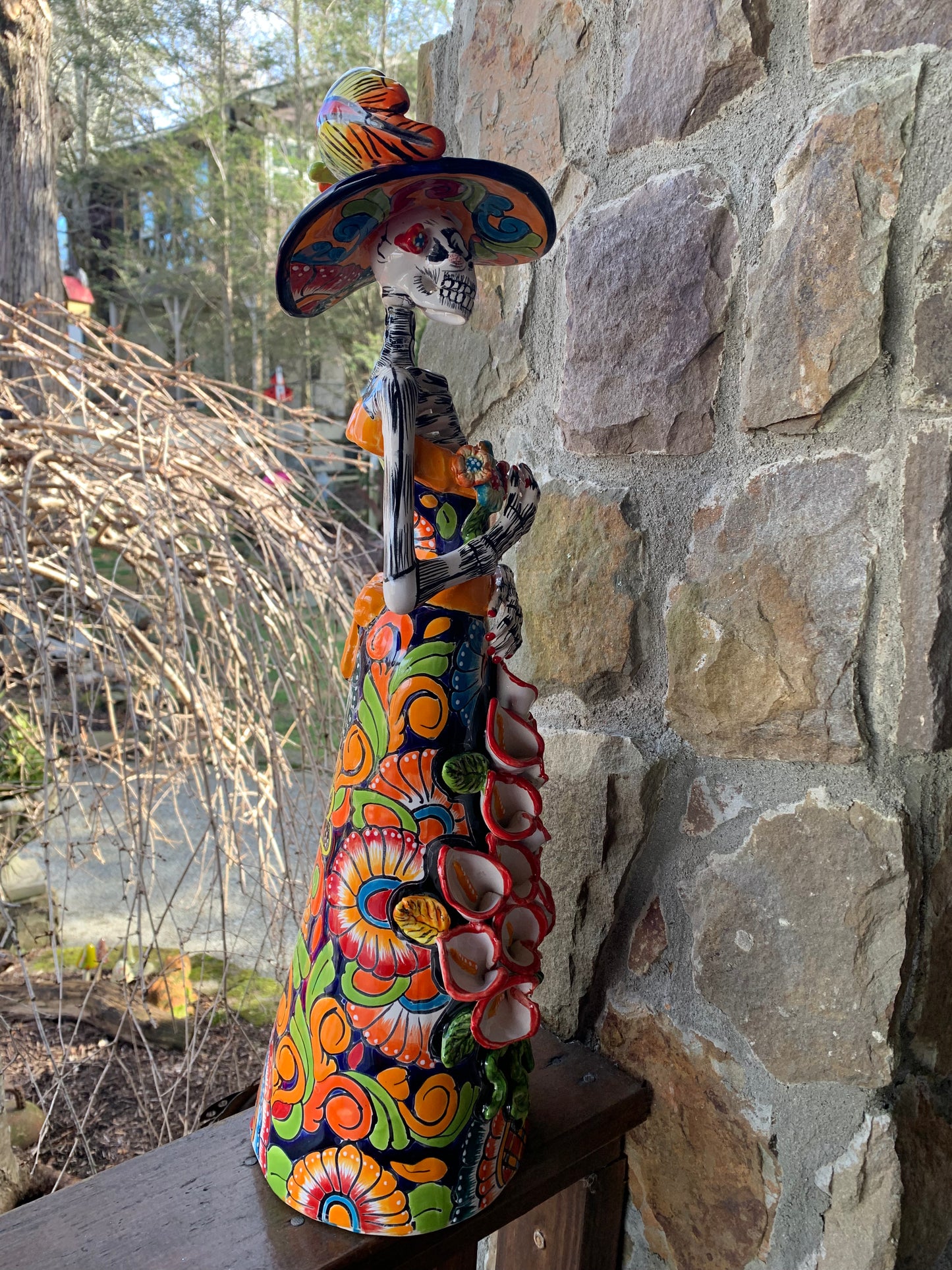 Talavera Catrina skeleton doll with Cala lilies
