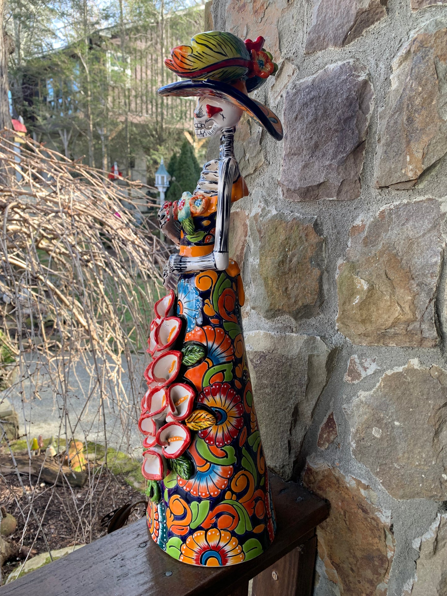 Talavera Catrina skeleton doll with Cala lilies