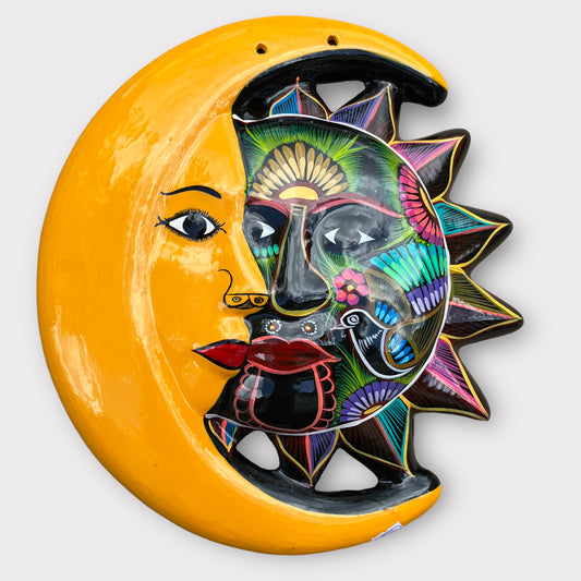 folk art mexican clay sun and moon eclipse