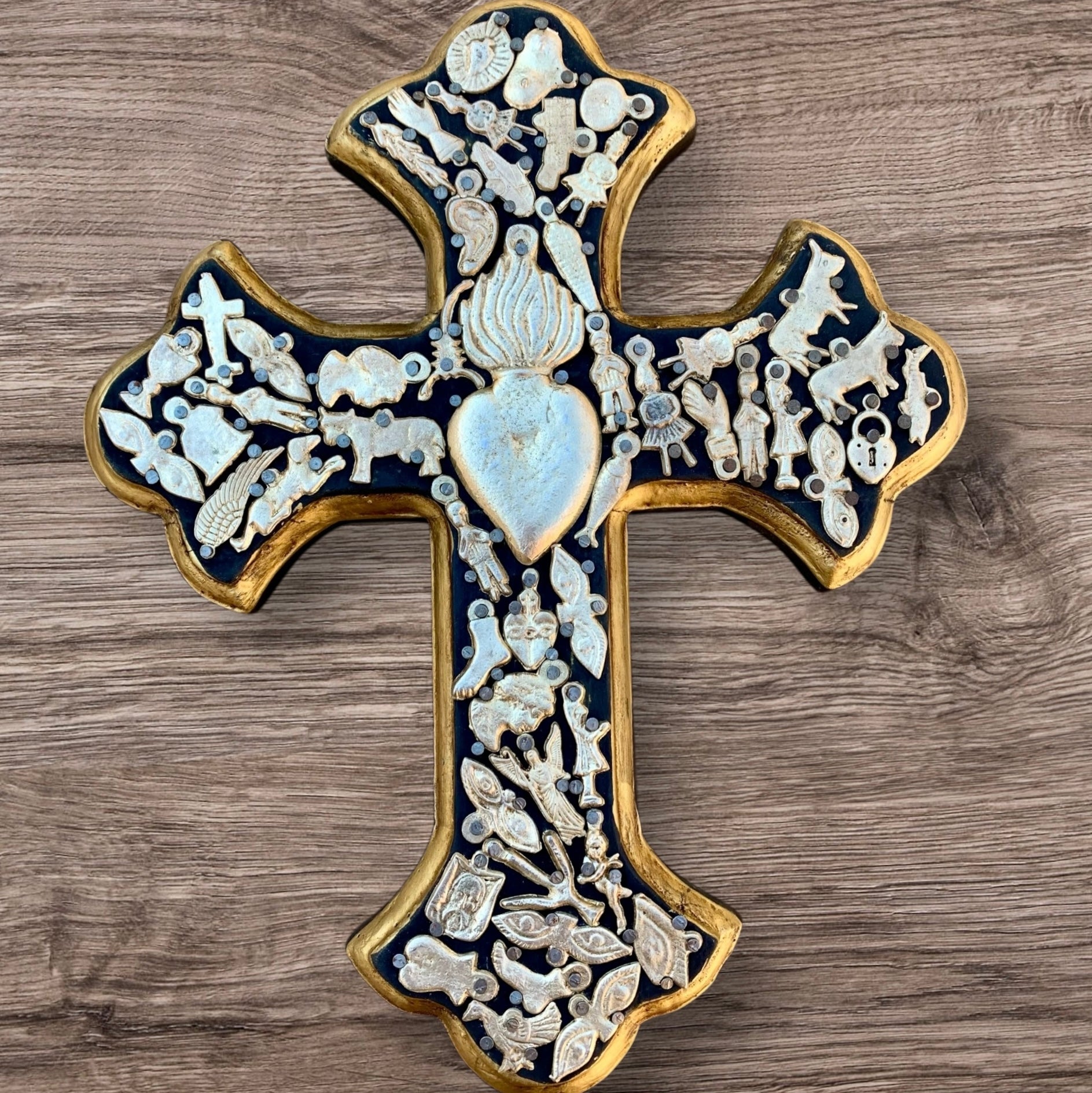 Milagros decorated wood cross dark stain