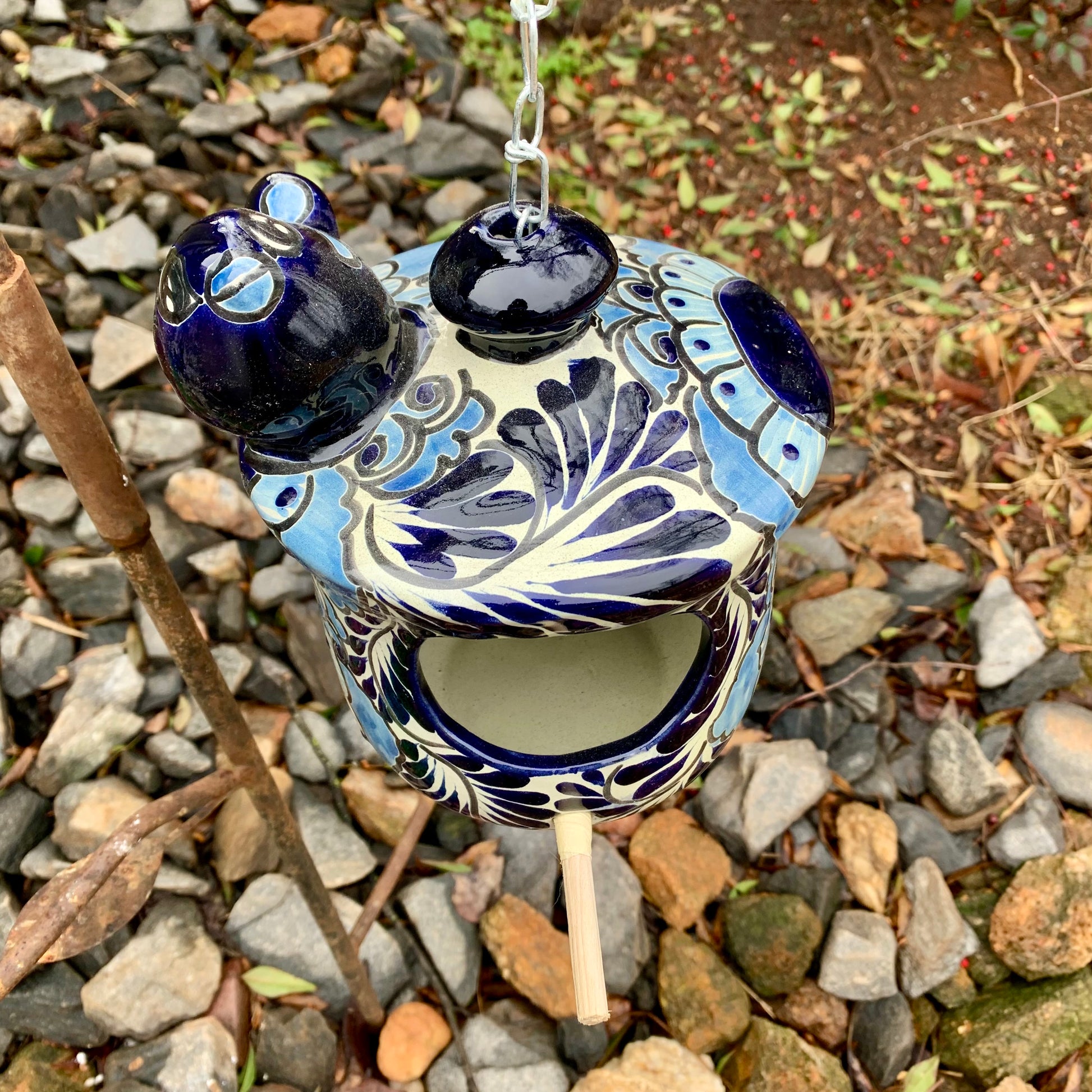 Mexican talavera birdhouse cottage in classic blue and white top view
