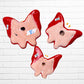 Three colorful talaver butterfly wall art pieces with a traditional style pattern, displayed against a white brick wall, back view of butterflies.
