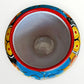 Colorful Mexican Talavera ceramic jar with lid decorated with intricate multicolor traditional patterns Inside views 