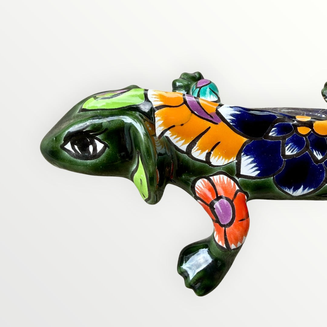 Mexican Talavera wall mounted iguana in dark green with multicolor designs face