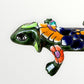 Mexican Talavera wall mounted iguana in dark green with multicolor designs face