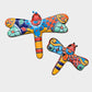 Colorful talavera dragonfly wall art on a white background