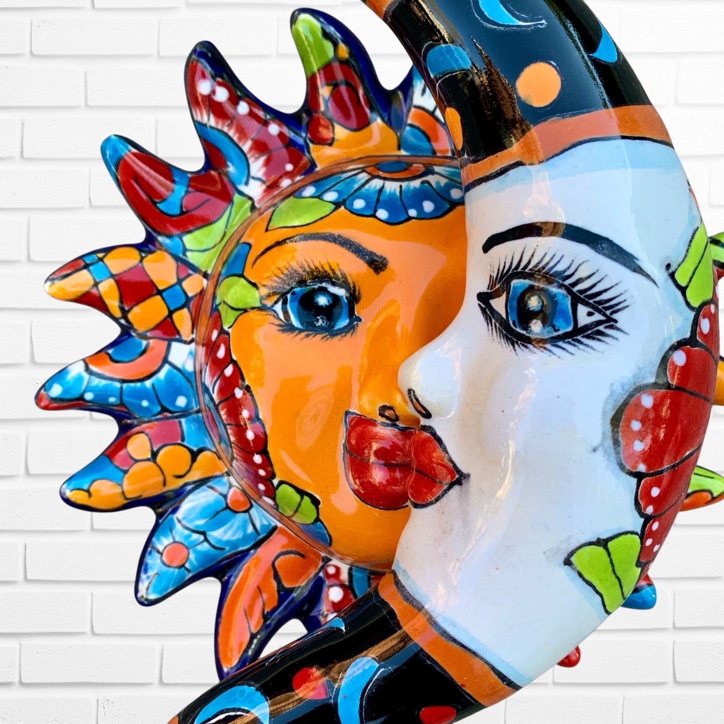 Close-up of sun and moon face