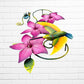 Decorative wall art with purple flowers and colorful hummingbirds on a white brick background bottom side view