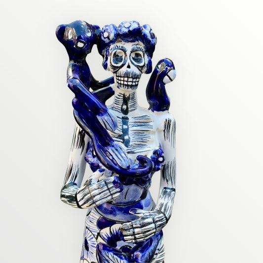 Frida and friends Catrina doll in blue and white Talavera face close up