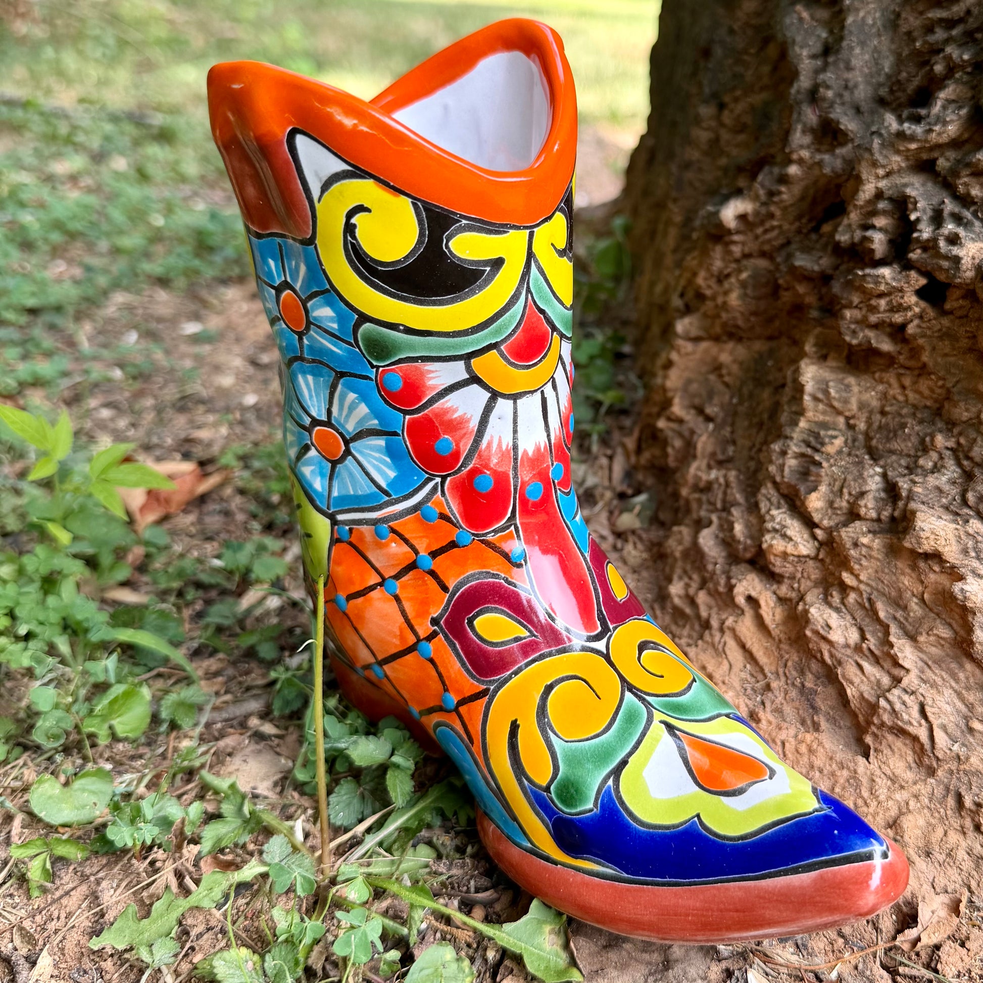 Orange, cowboy boot planter