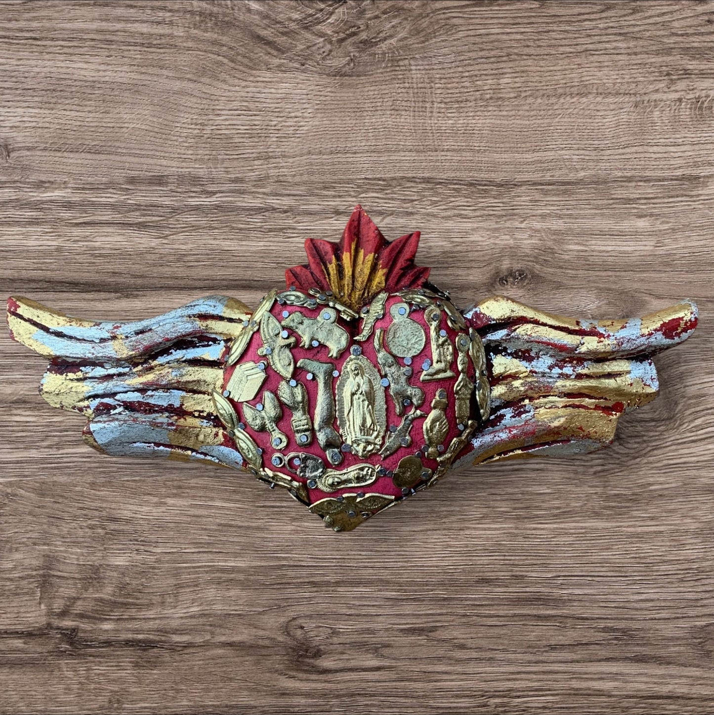 Milagros winged heart with guadalupe in center Front 