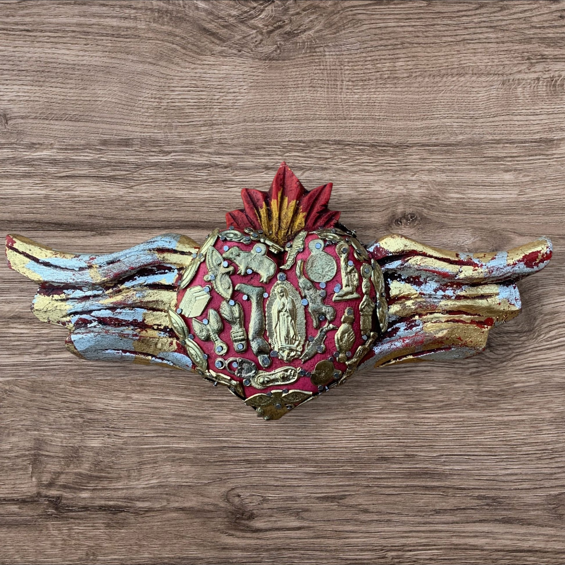 Milagros winged heart with guadalupe in center Front 