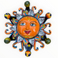 A colorful hand-painted Talavera ceramic sun wall decor piece with a smiling face, orange center, planets, and multicolored rays on a plain white background.