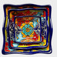 Three colorful talavera square nesting bowls with intricate patterns