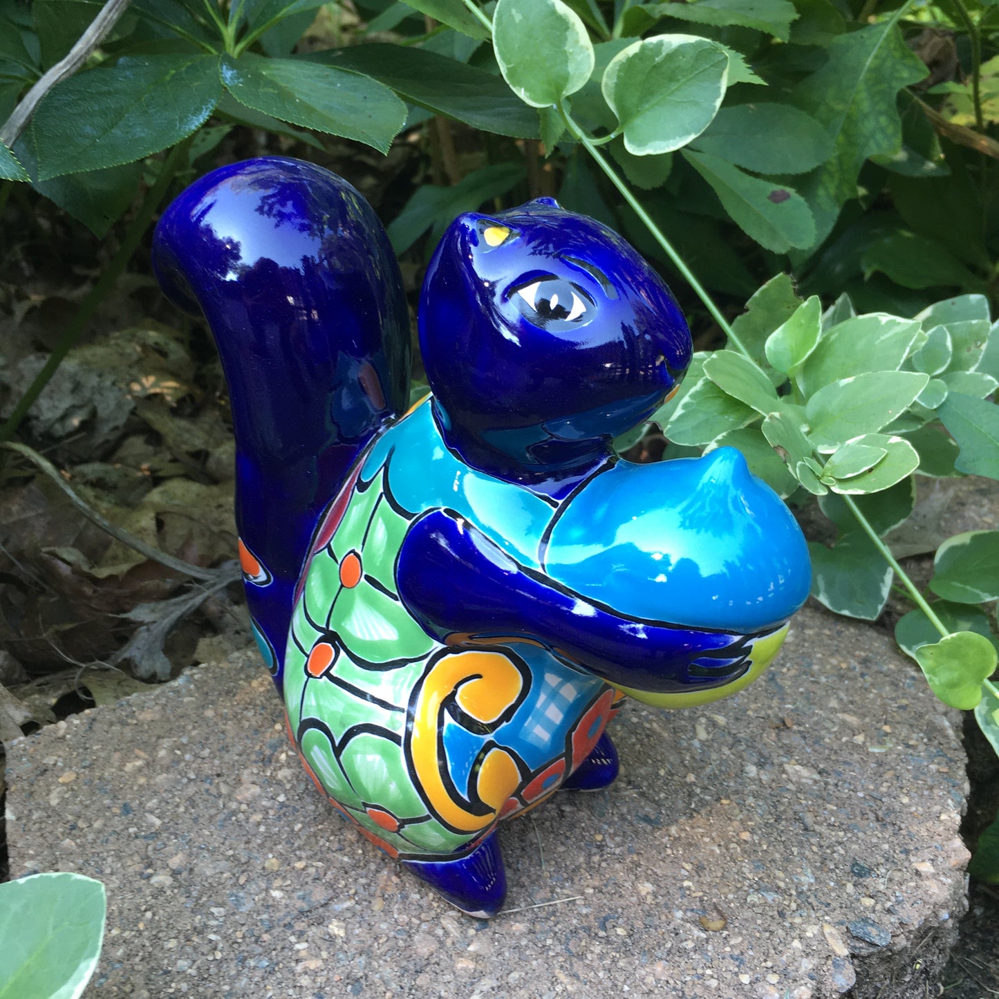 Talavera squirrel holding nut