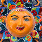 Talavera wall sunface with planets face close up