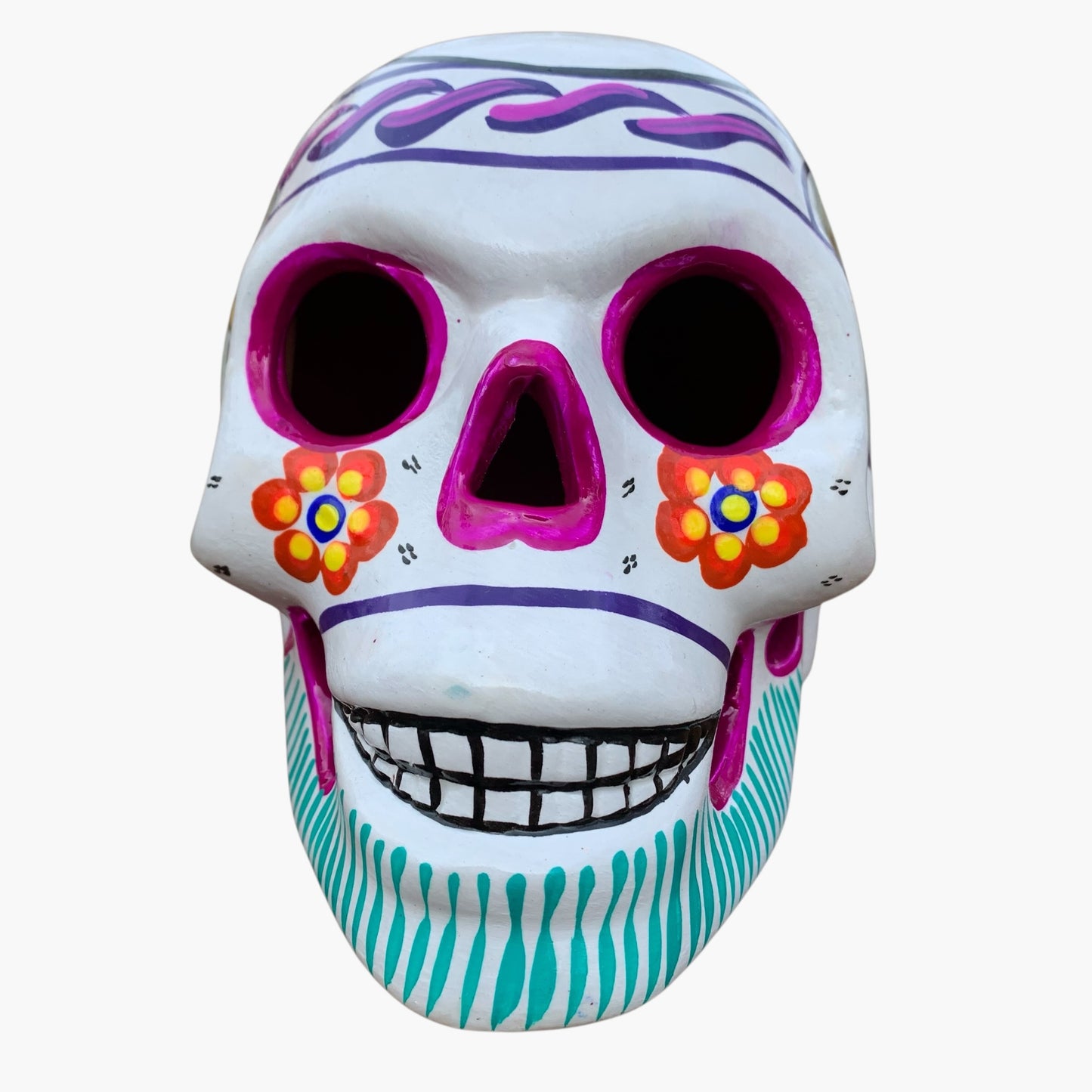 Colorful Mexican Sugar skull white with vibrant designs on a white background front