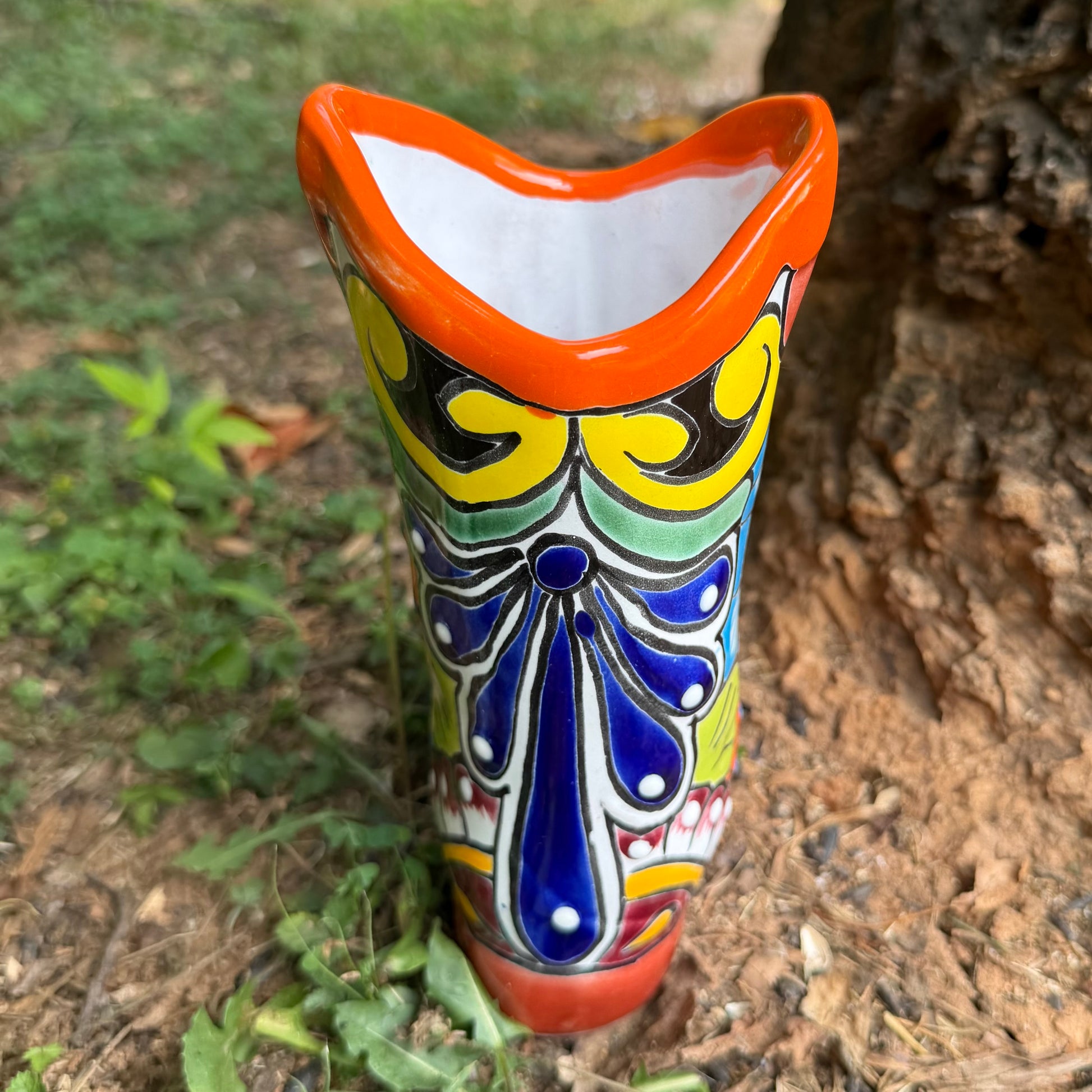 Orange cowboy be planter back view